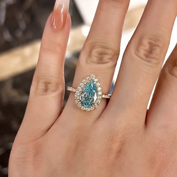 Unique Halo Rose Gold Pear Cut Cyan Blue Engagement Ring in Sterling Silver