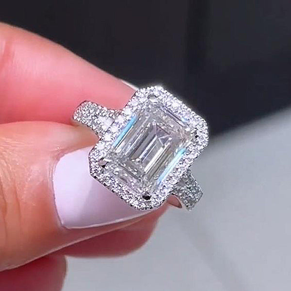 Elegant 5.5 Carat Halo Emerald Cut Women's Engagement Ring in Sterling Silver