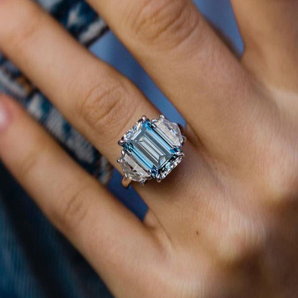 Romantic Emerald Cut Light Aquamarine Engagement Ring with Three Stone