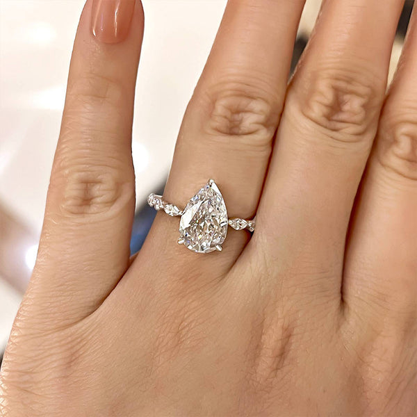 Lovely Pear Cut Solitaire Engagement Ring in Sterling Silver