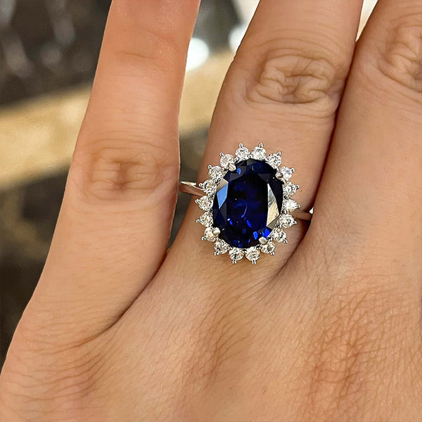 Vintage 4 Carat Oval Cut Blue Sapphire Halo Engagement Ring in Sterling Silver