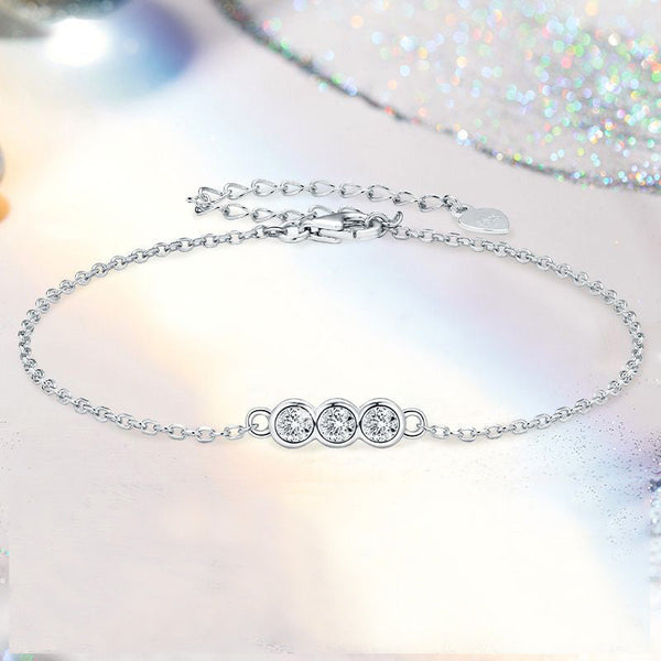 Elegant Moissanite Exclusive Bezel Round Cut Bracelet in Sterling Silver